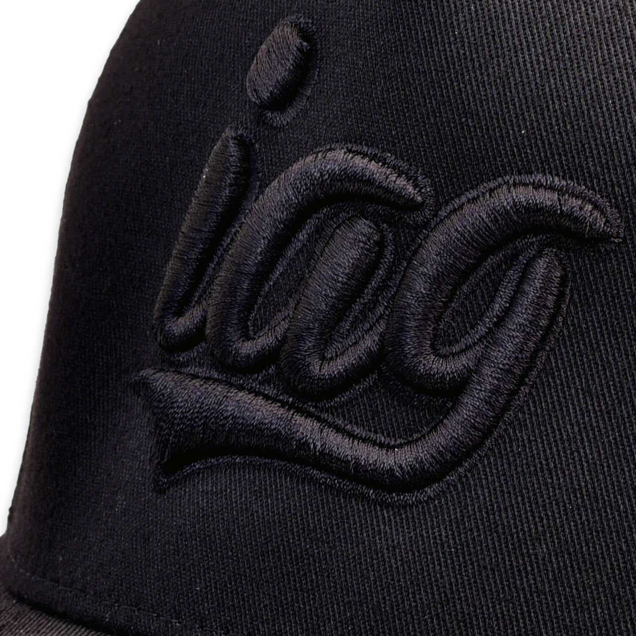 IAG Performance Flexfit Cap with Black Script Logo - Close-up