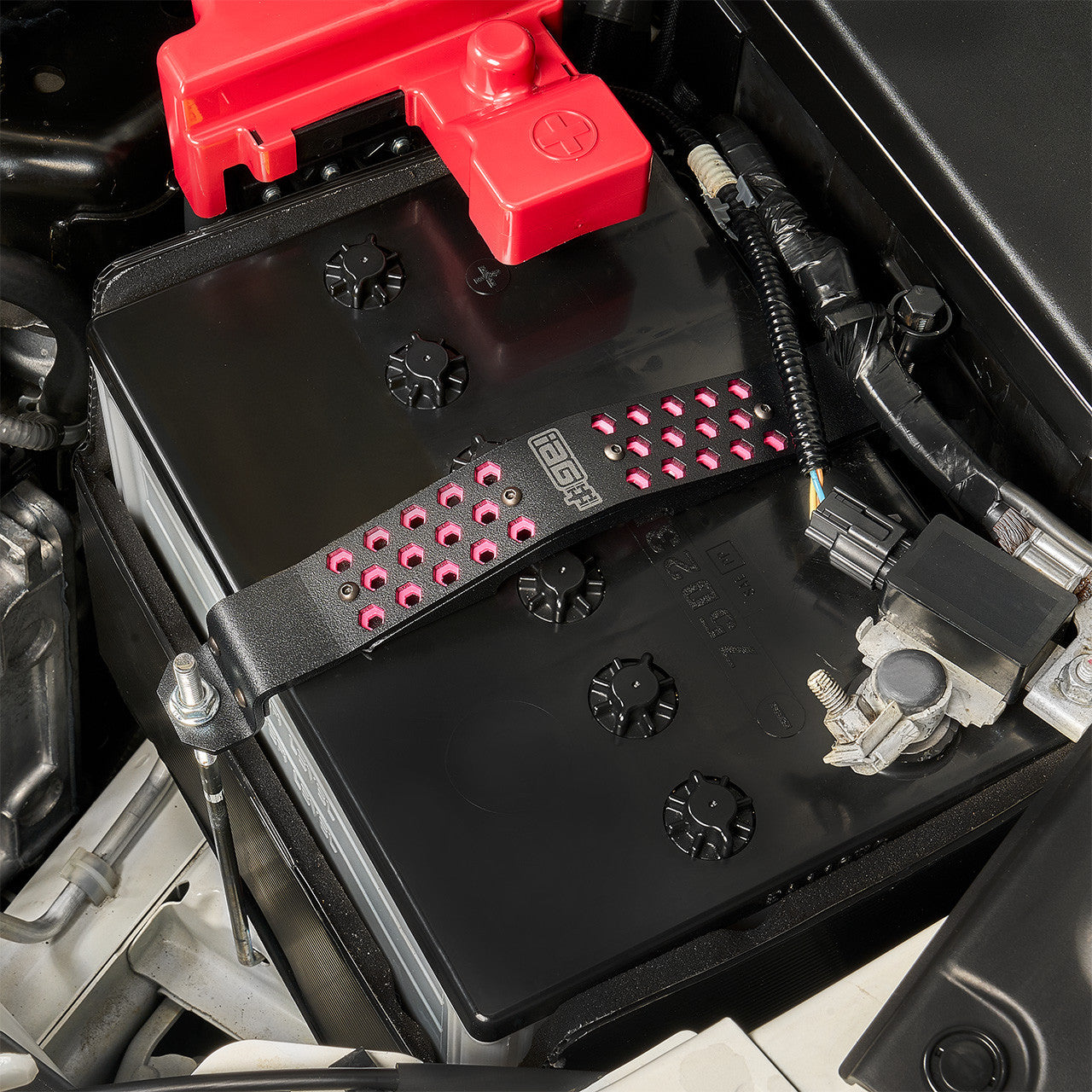 IAG Subaru Battery Tie Down - Pink Installed