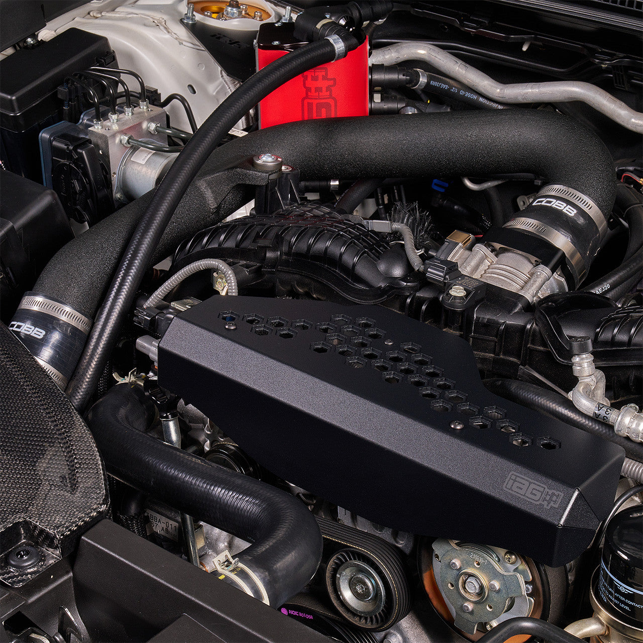 IAG Alternator Cover For 2022-26 WRX - Black Installed Close-up