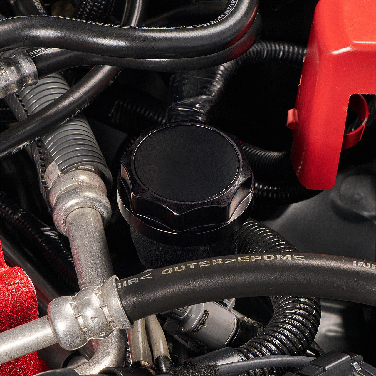 IAG Revolve Engine Bay Dress-Up Cap Kit for 15-21 STI - Black Oil Cap Install Close-up  2