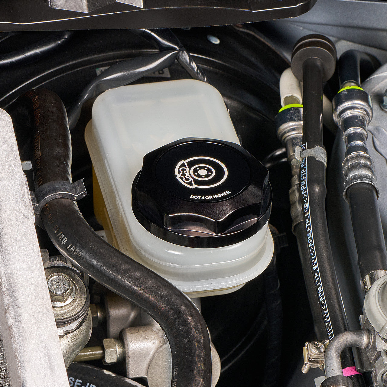 IAG Revolve Engine Bay Dress-Up Cap Kit for 15-21 STI - Black Brake Cap Install Close-up