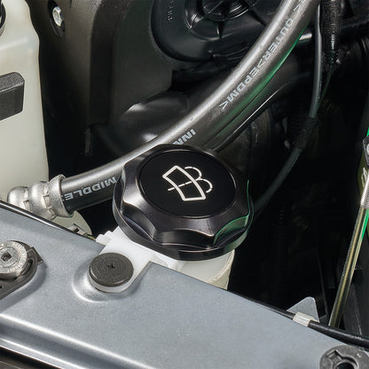 IAG Revolve Engine Bay Dress-Up Cap Kit for 15-21 STI - Black Washer Cap Install Close-up