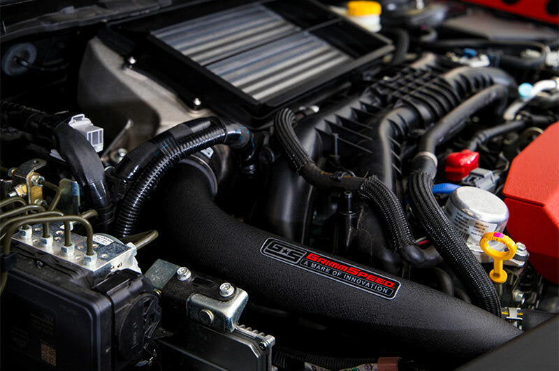 GrimmSpeed Black Charge Piping in the engine bay for 15+ WRX TMIC